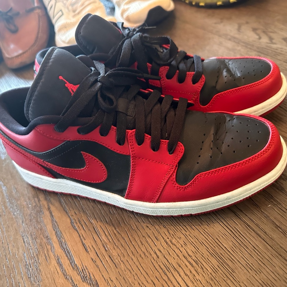Nike Air Jordan 1 Low sneakers in the 'Reverse Bred' colorway.